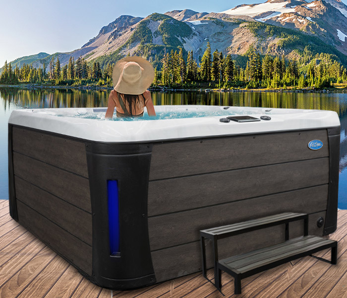Calspas hot tub being used in a family setting - hot tubs spas for sale Ciudad De La Costa
